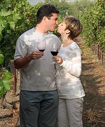 Romantic couple at a Napa Valley vineyard, wine tasting